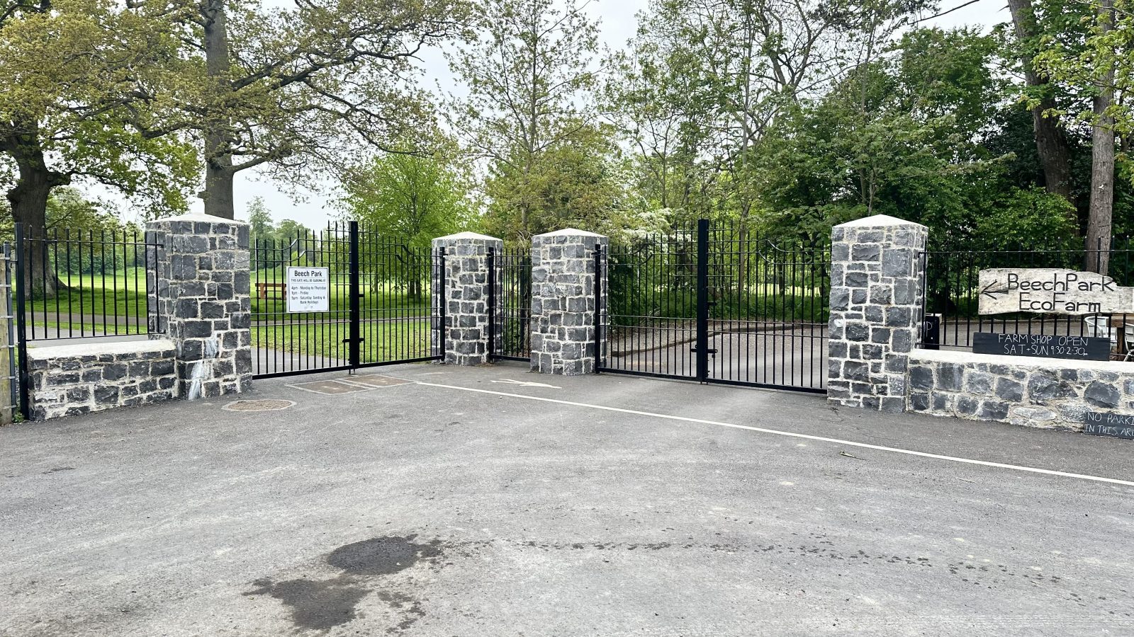 Natural limestone entrance pillars with gates and railings, by L&A Building Experts