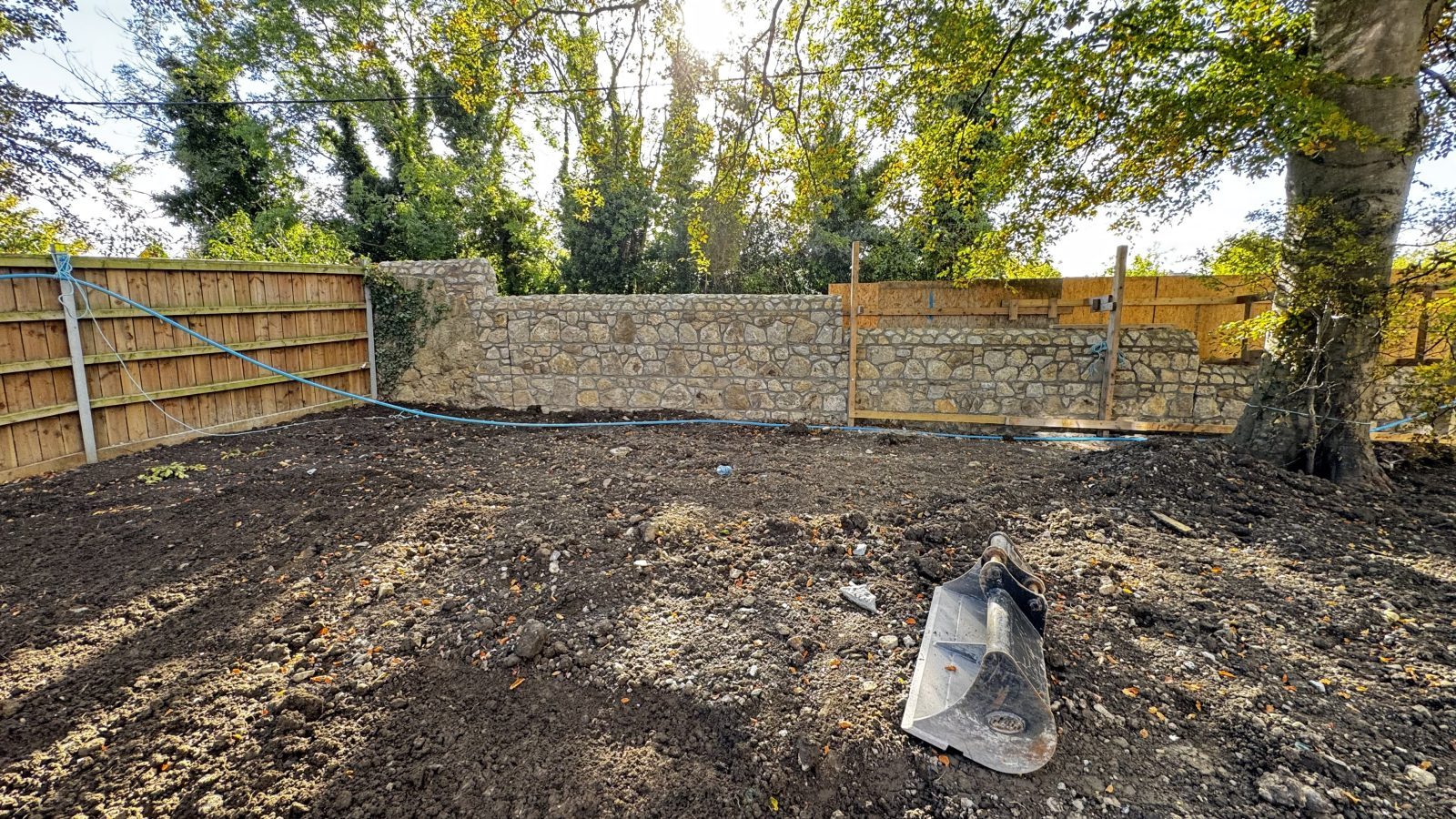 Finished natural granite stone boundary wall in Dublin by L&A Building Experts