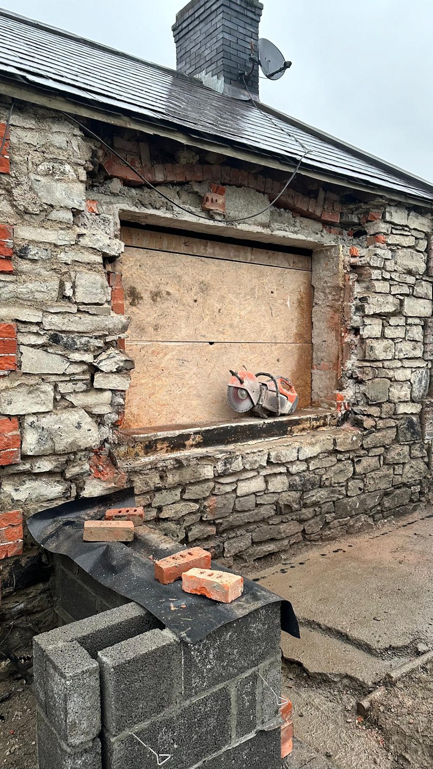 Swords cottage restoration — fireplace and hearth taking shape