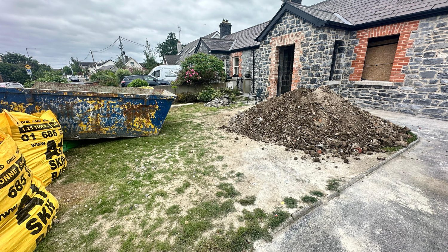 Swords cottage restoration — site during works with skip