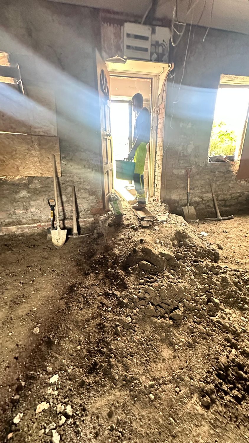 Swords cottage restoration — floor dug out for new foundations