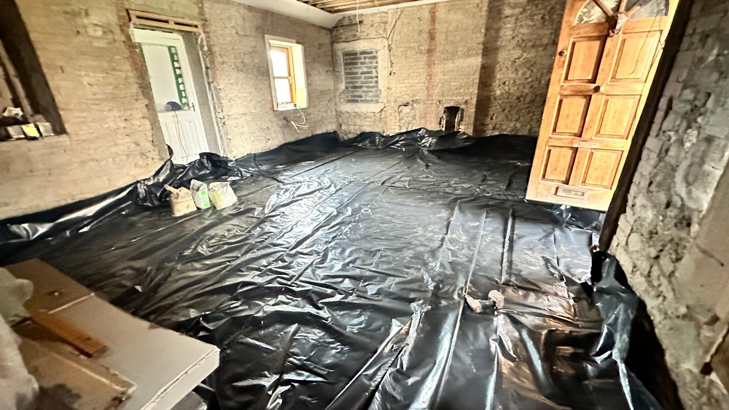 Swords cottage restoration — floor prepared with membrane