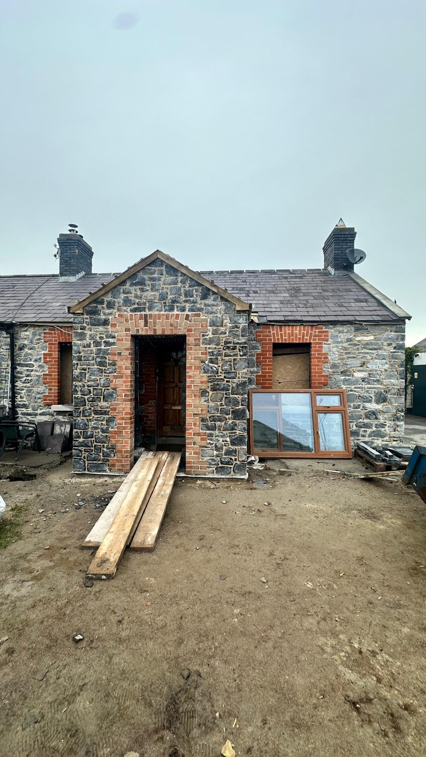New stone porch with brick surround built on new foundations during cottage restoration, Swords Dublin