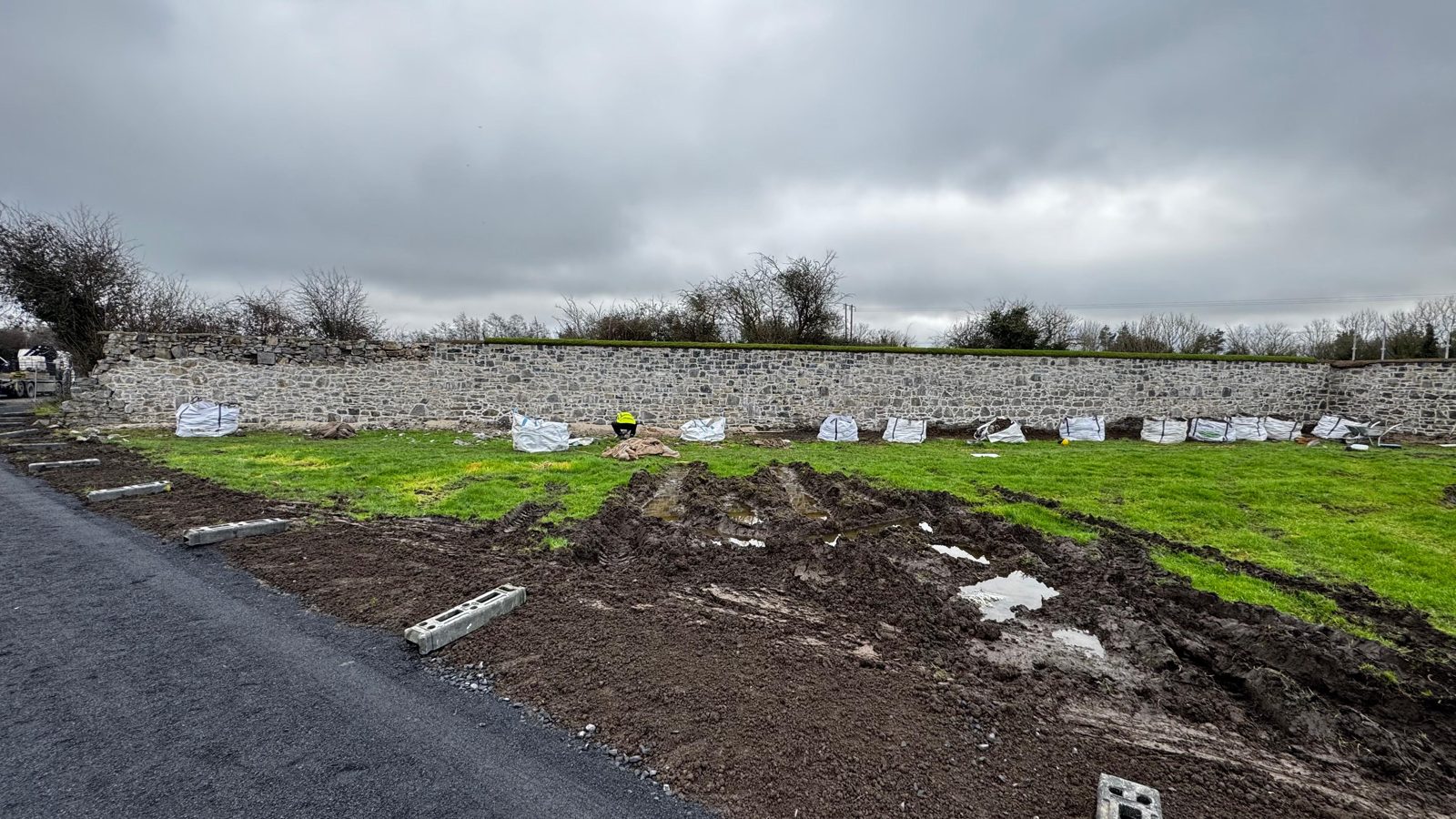 The Wonderful Barn Leixlip — excavation at the wall base for foundation repair