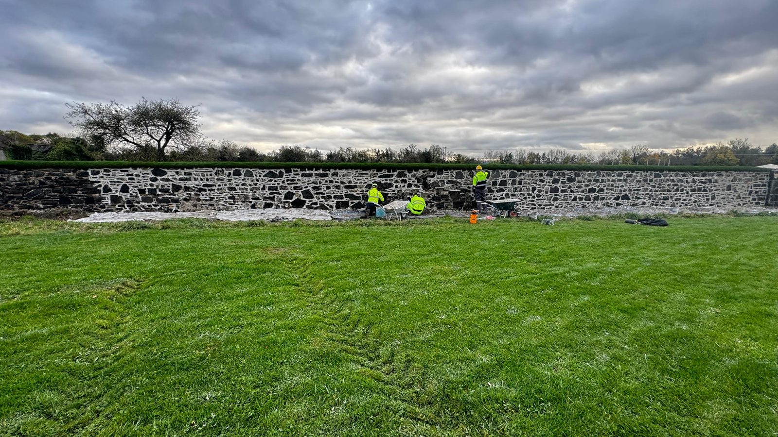 The Wonderful Barn Leixlip — team repointing the historic walls in lime